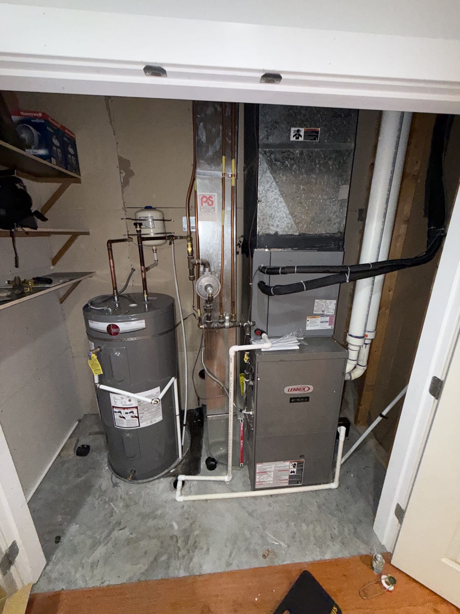 Mechanical room with tank and furnace